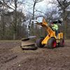 Hydraulische grondboor kniklader